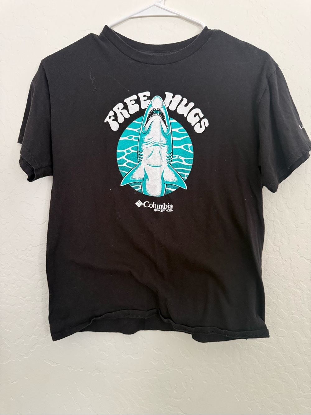 Columbia Black Tee with Teal Shark 'Free Hugs' Graphic